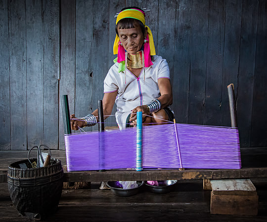 Kayan Woman Stringing Purple Thread (2017)