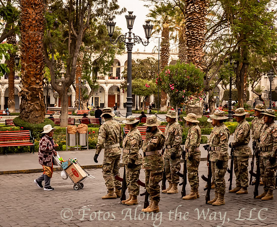 Soldiers and a Vendor in Plaza (Peru)
