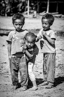 Three Curious Boys Tussling (Myanmar, 2017)