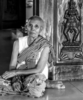 Woman Sitting in Buddhist Temple (Cambodia, 2014)