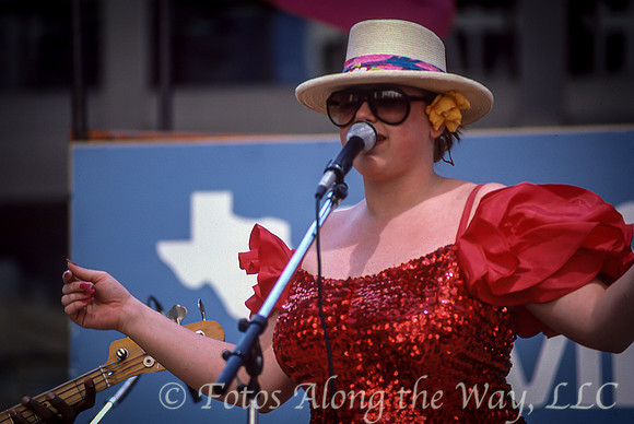 Woman Singing on Outdoor Stage (Texas)