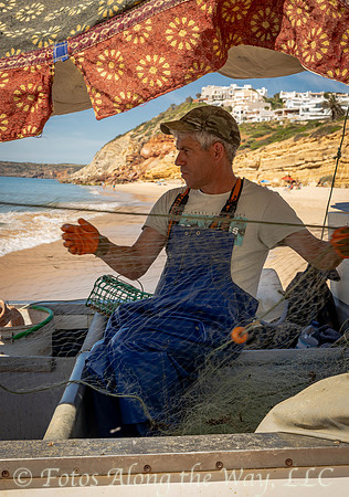 Fisherman on Boat Pulling Net (Portugal)