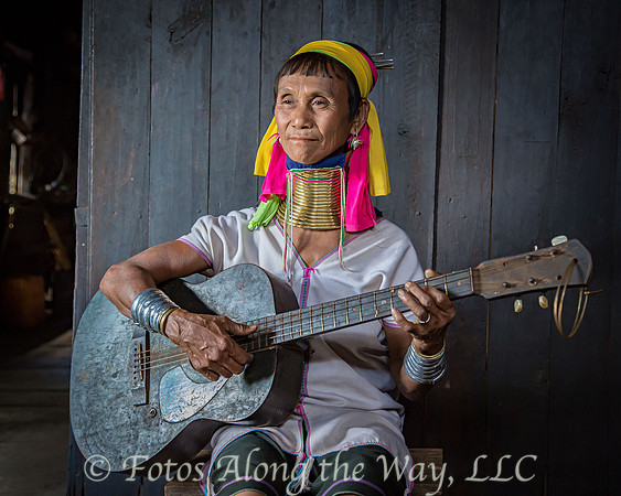 Kayan Woman Playing Guitar (Myanmar)