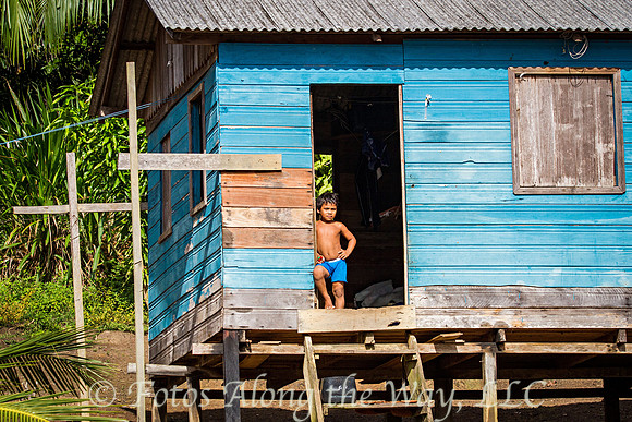 Curious Boy in Riverside Home #1 (Amazonia, Brazil)