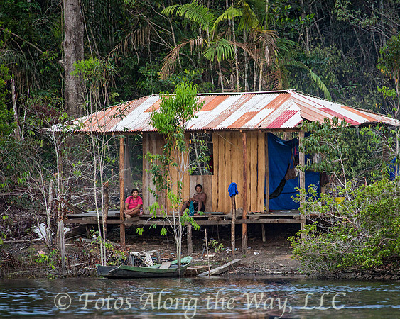 Couple on Riverside Porch (Amazonia, Brazil)