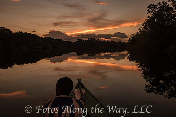 Amazon Basin Canoe Guide at Sunset (Amazonia, Brazil)