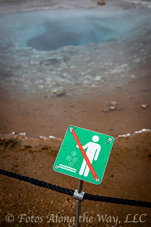 Do Not Throw Coins into the Geyser Pool (Iceland)