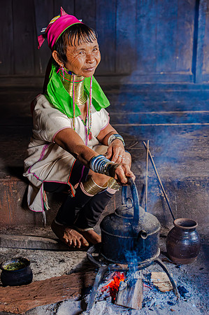 Kayan Woman Heating Water for Tea (2017)