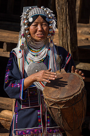 Akha Tribe Woman Playing Drum (2017)