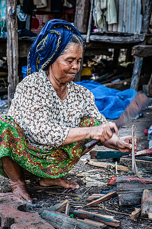 Woman Splitting Wood (2014)
