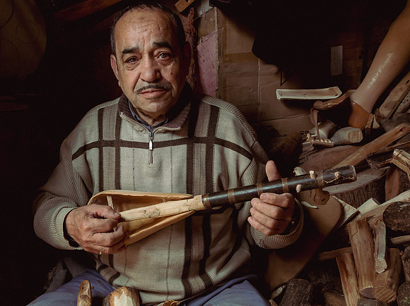 Wood Worker with Unfinished Instrument (2016)