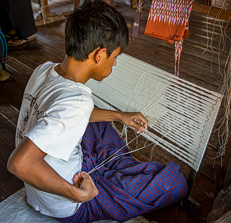 Young Weaver Working on White Mat (2017)